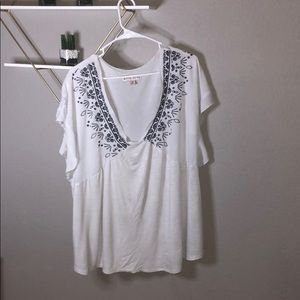 A white shirt with beautiful stitching